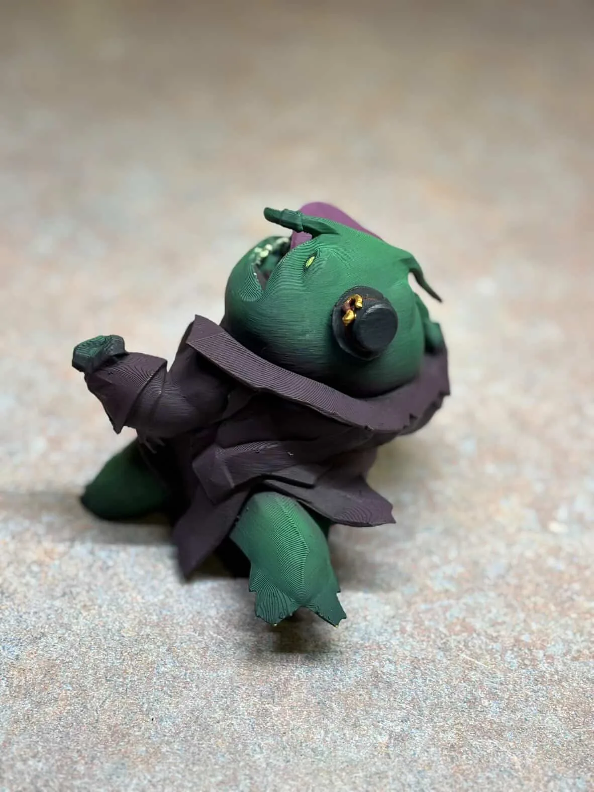 Rear three-quarter view of the Tahm Kench figure