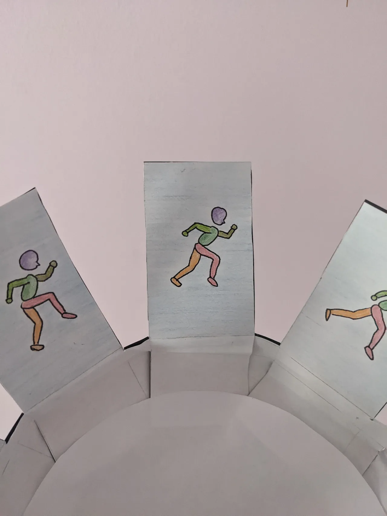 Paper zoetrope with a hand-drawn running cycle